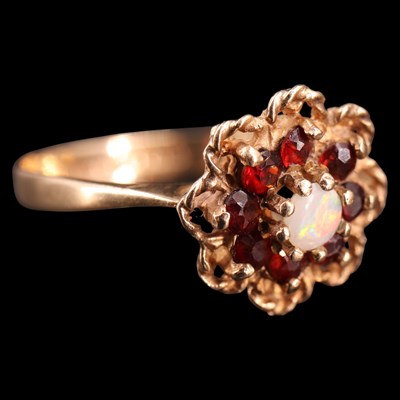 Lot 1018 - A 1970s opal and garnet flowerhead cluster...