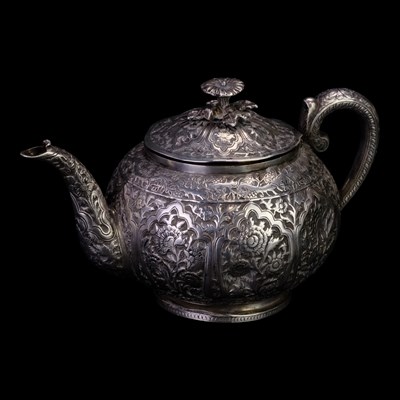 Lot 894 - A 19th Century Indian Kutch silver teapot, of...