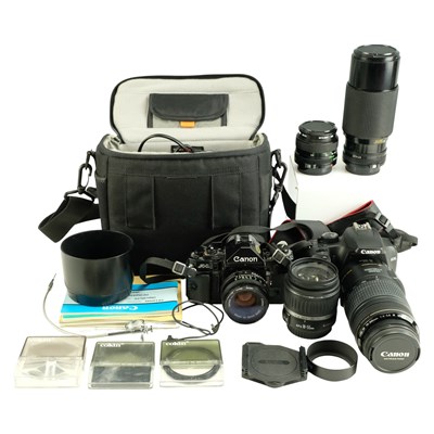 Lot 611 - Canon 1000D digital and A1 film cameras,...