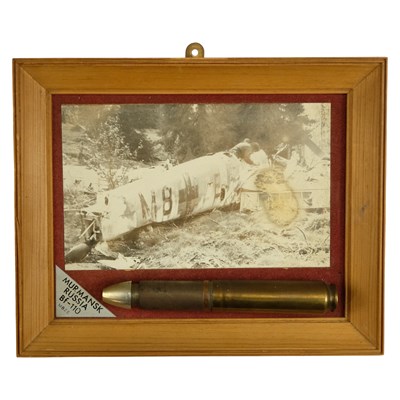 Lot 222 - A framed inert 1939 German 20mm shell,...