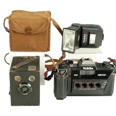 Lot 615 - A 1920s Kodak Six-20 Brownie Junior box camera,...
