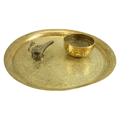 Lot 743 - An Indian engraved brass tray together with a...