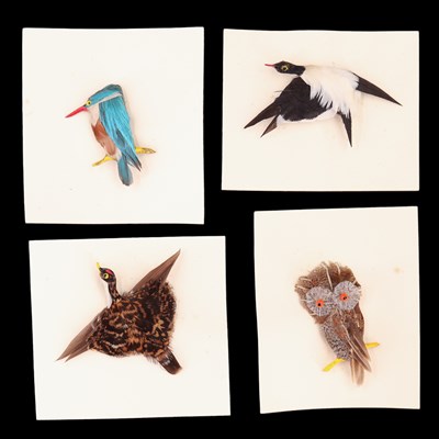 Lot 997 - Four vintage feather brooches in the form of...