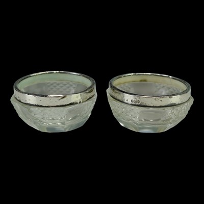 Lot 902 - A pair of George V silver-collared cut glass...