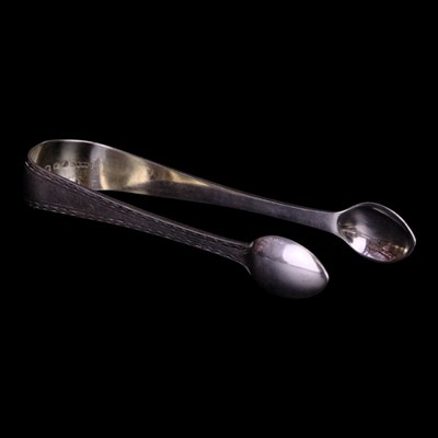 Lot 909 - Victorian bright-cut silver sugar...