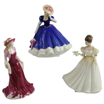 Lot 1037 - Three Royal Doulton figurines, comprising...