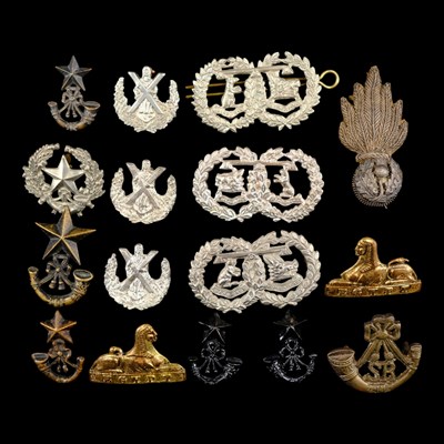 Lot 42 - A group of Scottish military collar badges,...