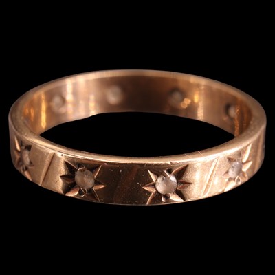Lot 952U - A vintage white sapphire eternity ring, being...