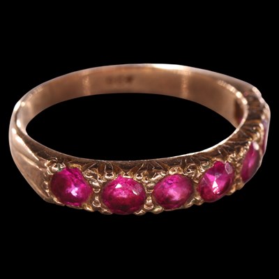 Lot 952P - A vintage ruby half-hoop eternity ring,...