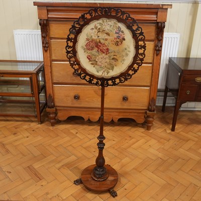 Lot 1200 - A Victorian rosewood pole screen, having a...