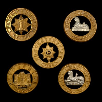 Lot 63 - Five various other ranks' helmet plate centres