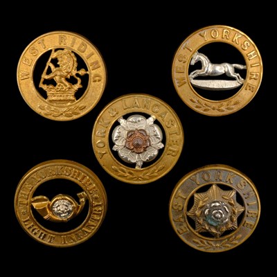 Lot 67 - Five various other ranks' helmet plate centres