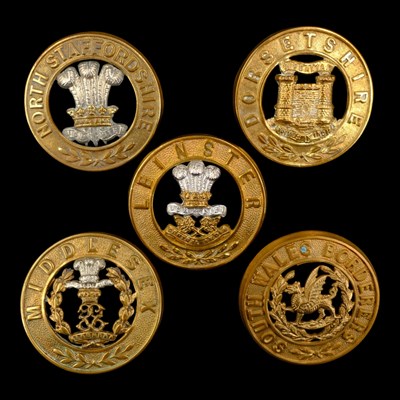 Lot 69 - Five various other ranks' helmet plate centres