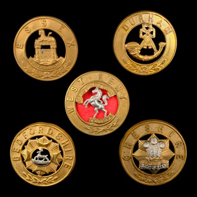 Lot 72 - Five various other ranks' helmet plate centres