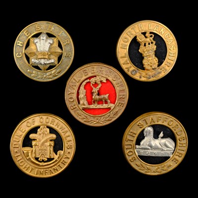 Lot 73 - Five various other ranks' helmet plate centres