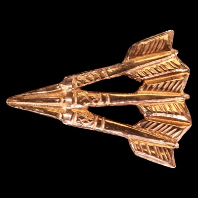 Lot 1317 - A 1990s 9 ct gold tie tack, in the form of...