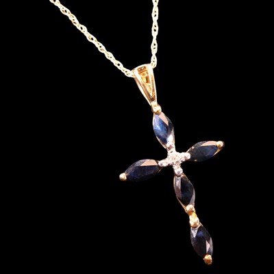 Lot 1328 - A contemporary sapphire and diamond pendant...