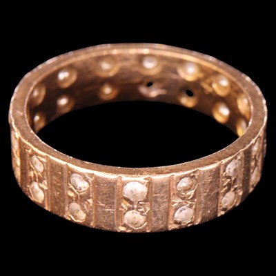 Lot 1332 - A 1980s paste and 9 ct gold eternity...