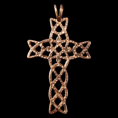 Lot 1338 - A vintage yellow metal openwork pendant, in...