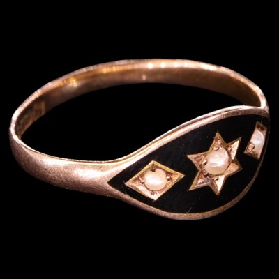 Lot 1345 - A 1919 pearl-set and black-enamelled 9 ct gold...