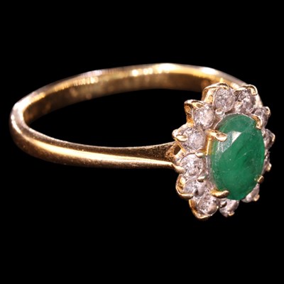 Lot 1364 - A near-contemporary emerald and diamond...
