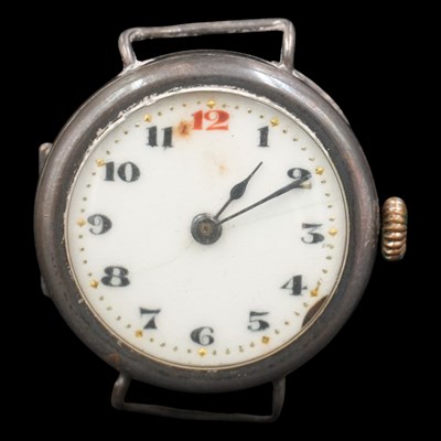 Lot 1541 - A 1920s lady's silver wristlet watch, having a...