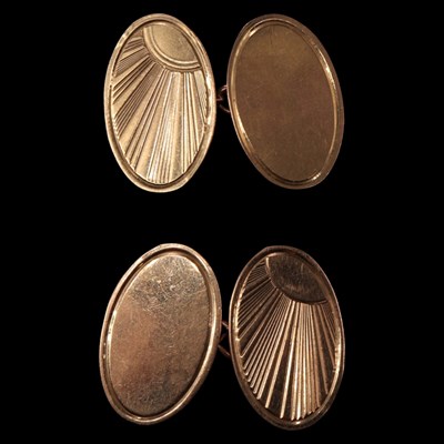 Lot 1374 - A pair of 1960s 9 ct gold oval cufflinks,...