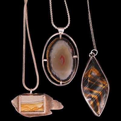 Lot 1391 - Three Modernist artisanal silver / white metal...