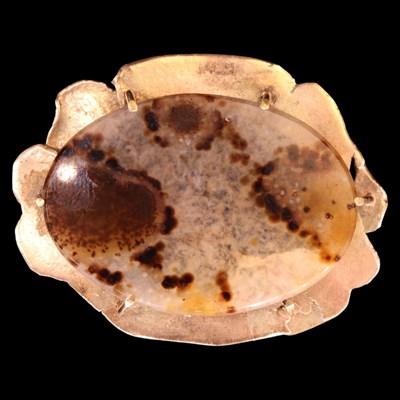 Lot 1393 - A Modernist artisanal fossilised coral pendant...