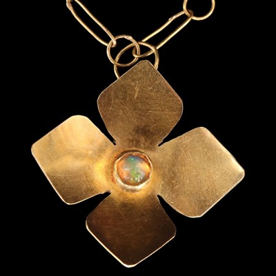 Lot 1394 - A Modernist artisanal opal and 18 ct gold...