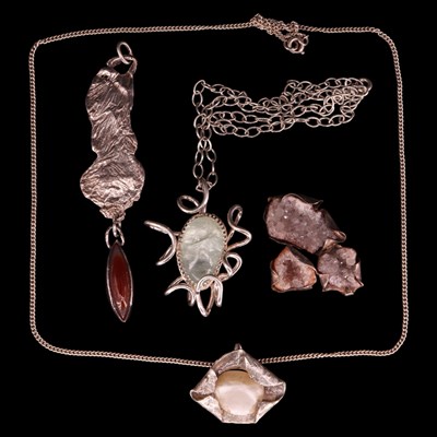 Lot 1396 - Four Modernist artisanal silver / white metal...