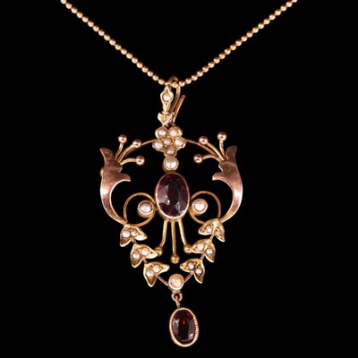 Lot 1373 - A Belle Epoque garnet and seed pearl lavalier...