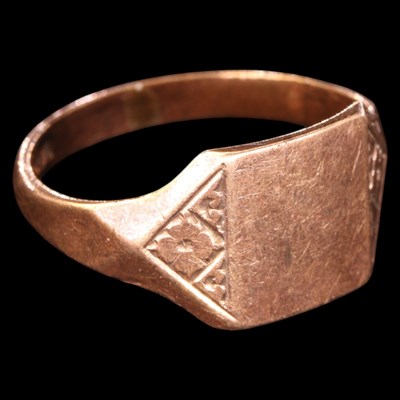 Lot 1405 - A 1960s 9 ct gold signet ring, having a vacant...