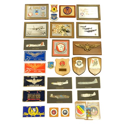 Lot 243 - A large quantity of US military plaques etc