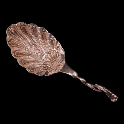Lot 1140 - A late 19th Century Dutch silver caddy spoon,...