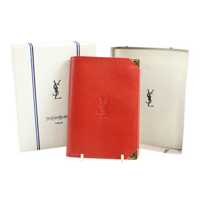 Lot 772 - A vintage Yves St Laurent red leather...