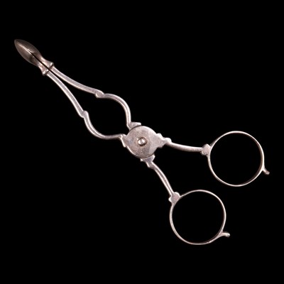 Lot 1149 - Edwardian silver tea tongs, in the manner of...