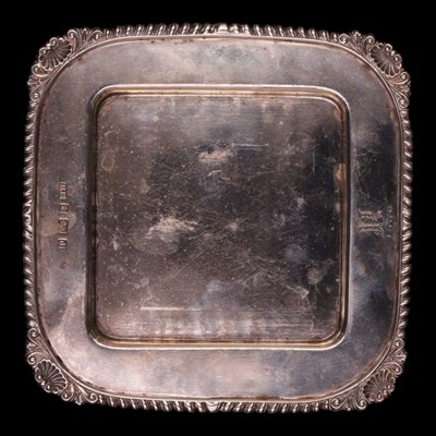 Lot 1152 - An Edwardian silver stand, of square form with...