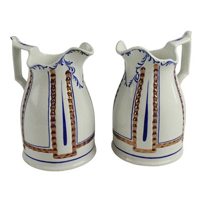 Lot 974 - A pair of Victorian earthenware jugs, blue and...