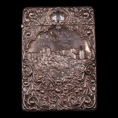 Lot 1155 - An Edwardian "castle top" silver visiting...
