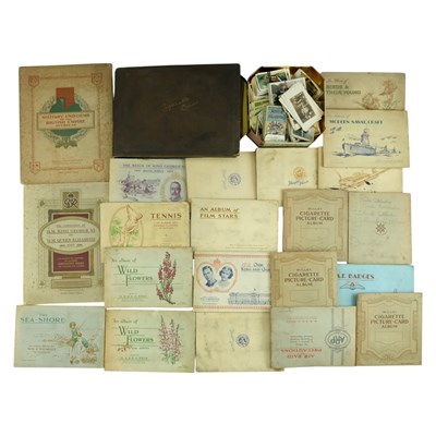 Lot 450 - A group of vintage cigarette card albums and...