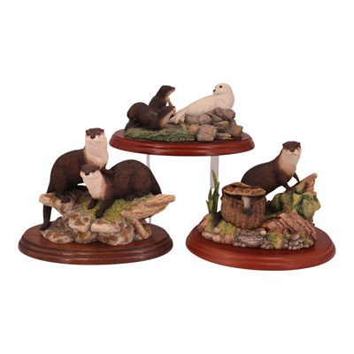Lot 1065 - Three Border Fine Arts otter figures,...