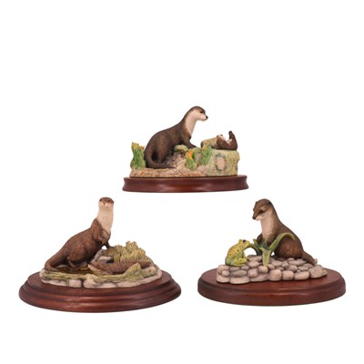 Lot 1068 - Three Border Fine Arts otter figures,...