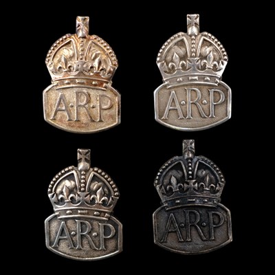 Lot 135 - Four Second World War silver ARP badges, in...