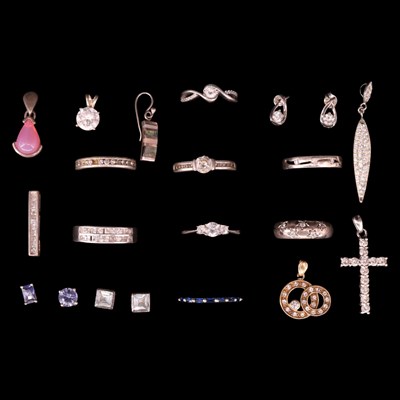 Lot 1423 - A group of contemporary gemstone-set white...
