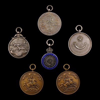 Lot 18 - A group of British military silver and other...