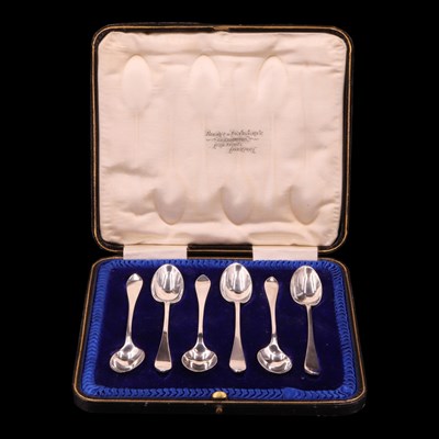 Lot 1161 - A George V cased set of silver coffee spoons,...