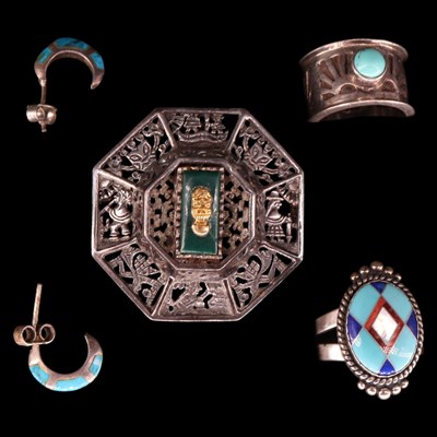 Lot 1434 - An American West white metal intarsia ring by...
