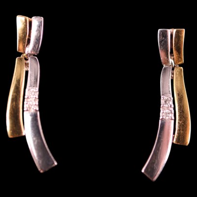 Lot 1444 - A pair of contemporary diamond and two-colour...