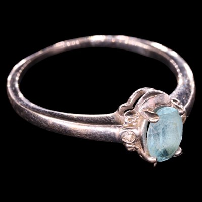 Lot 1446 - A near-contemporary blue topaz and diamond...